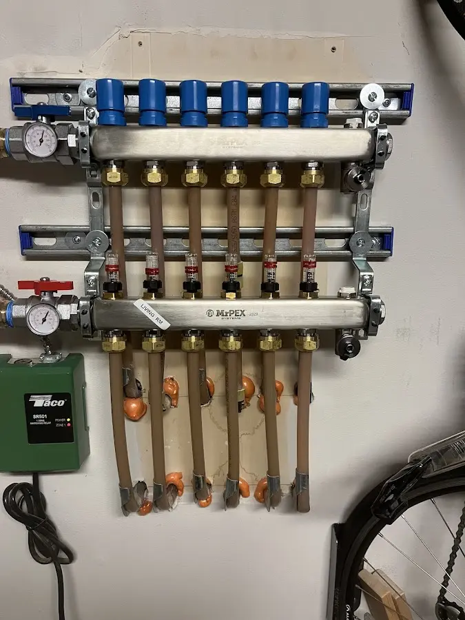 Plumber performing Water Heater Repair at a residential property in Seabrook